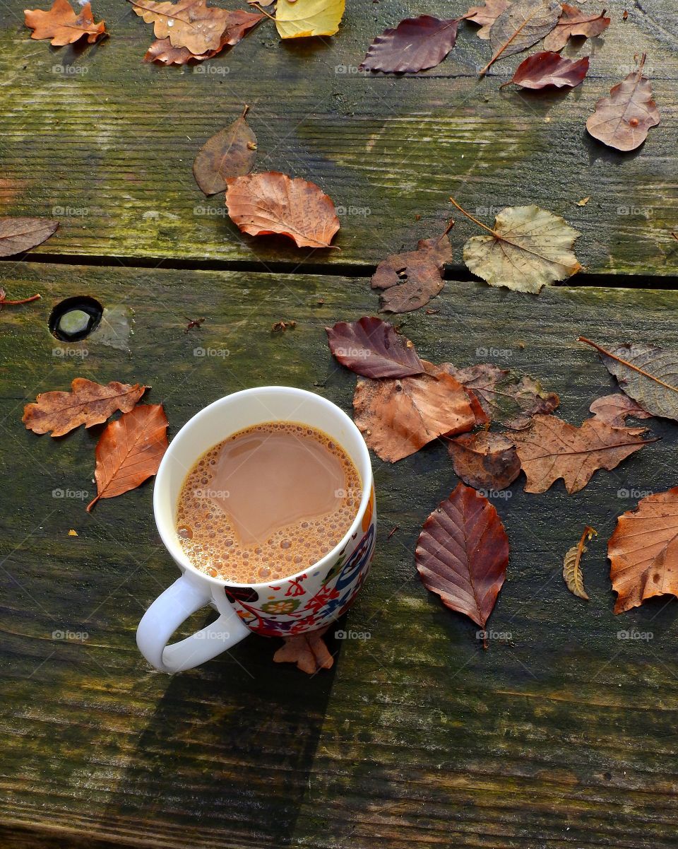 Coffee on old wooden table