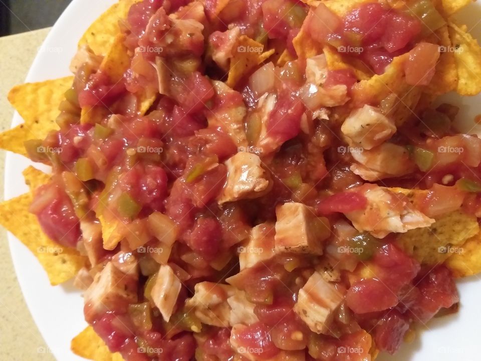Yummy Chicken Nachos a perfect snack for your evening.