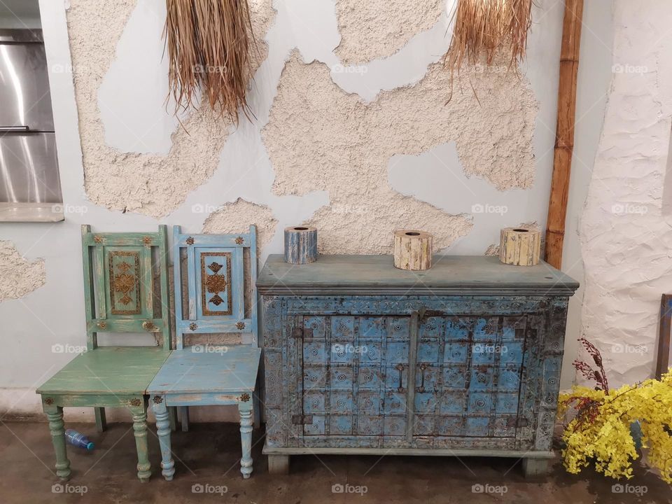 One old decoration design with cabinets and chairs dating back to old years