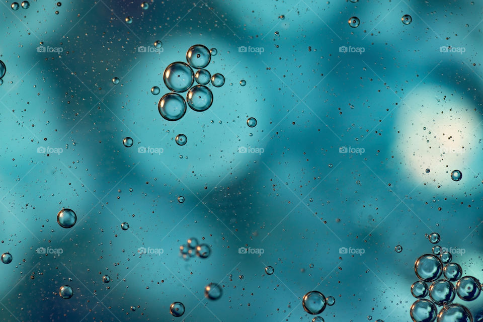 Abstract photography.  Colorful abstract background.  Drops of oil on the water. Art photography.