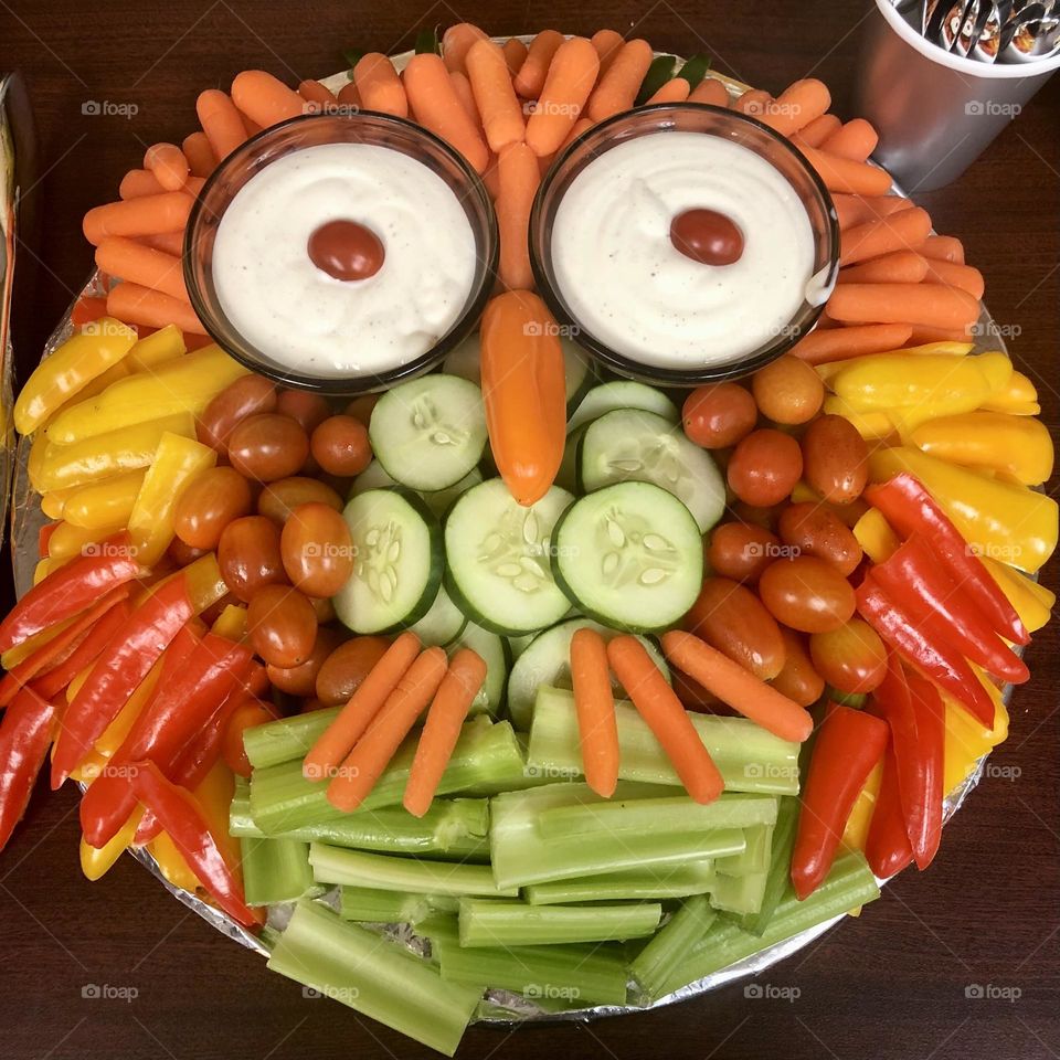Food Art! Vegetables along with Dip, layered and set to look like an Owl for a forest themed Party.  