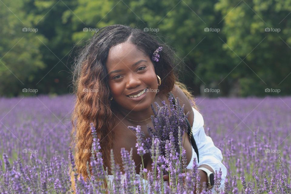 Young woman is a lavender field