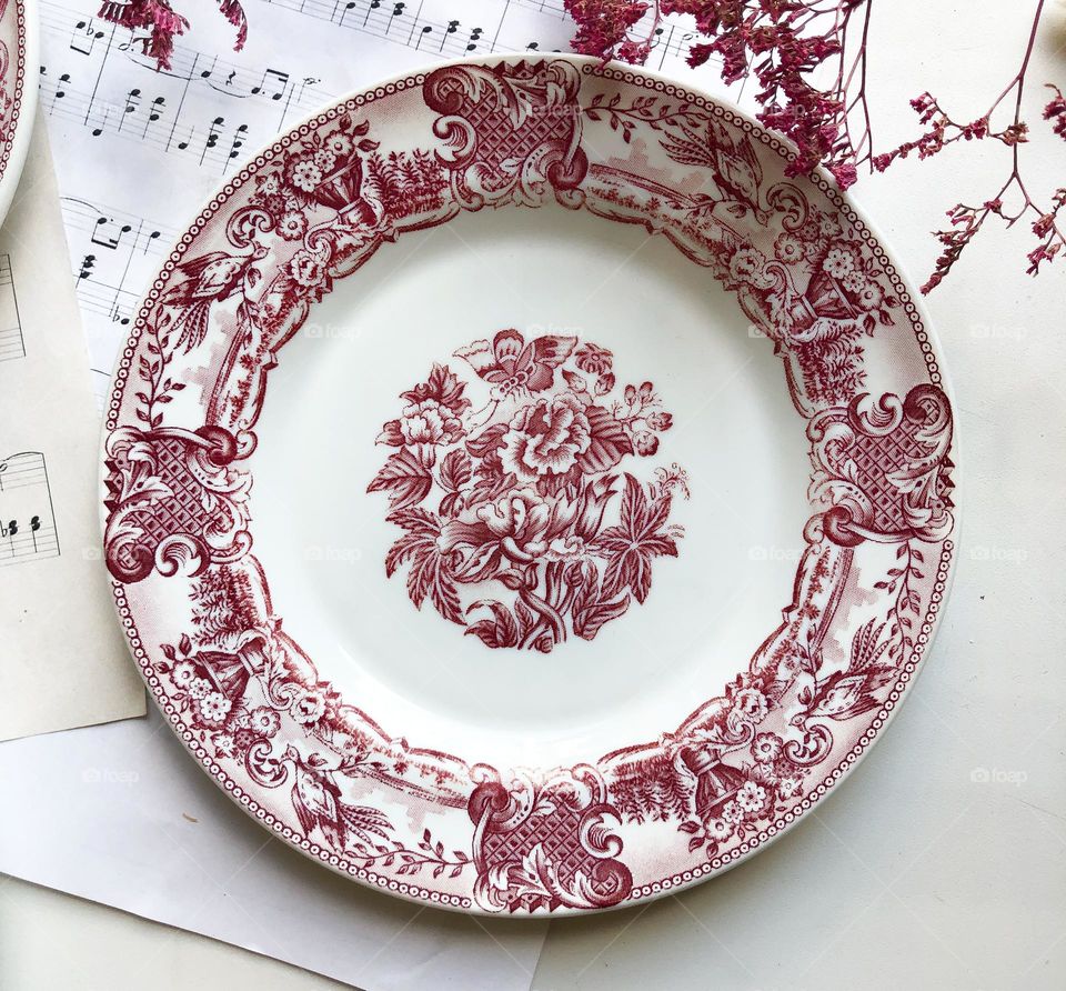 Old English porcelain plate with red ornament