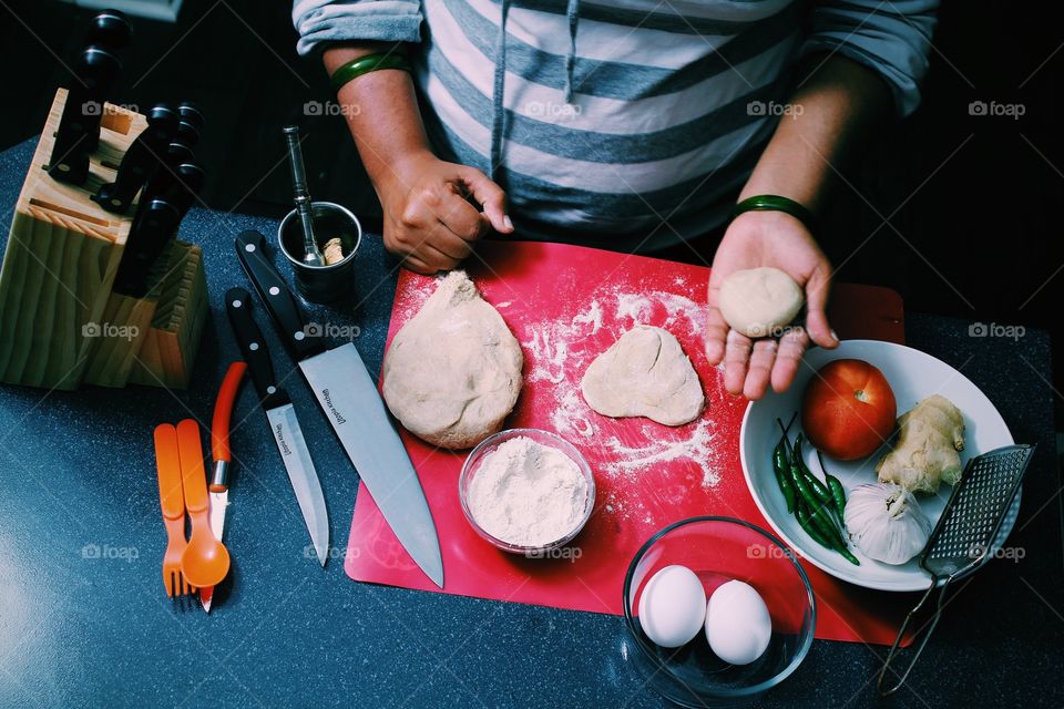 young woman working in her kitchen 