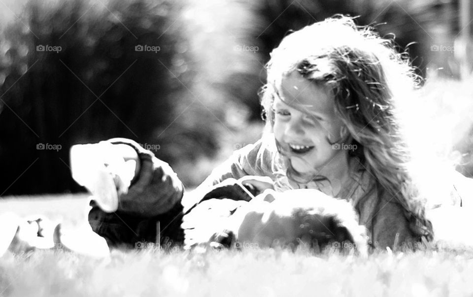 kids play . playing on grass