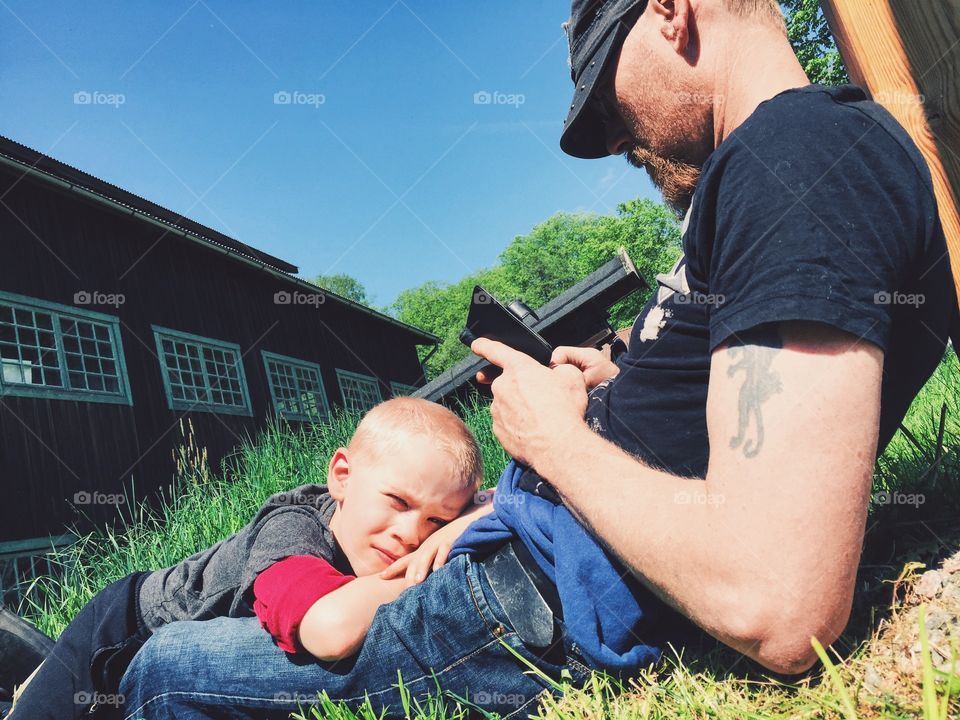 Father and son enjoying a day out in the sun