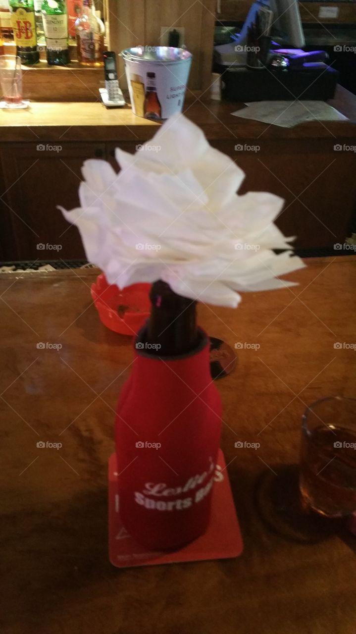 Napkin Rose in a beer bottle