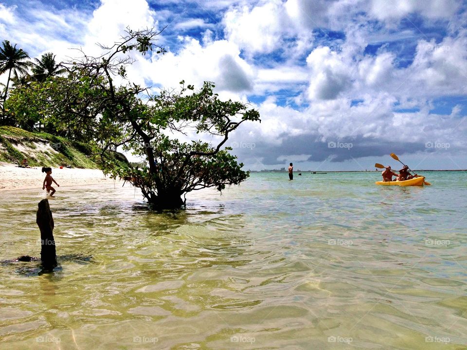 Porto de Galinhas beach . Some guys playing at the Porto de Galinhas beach. 