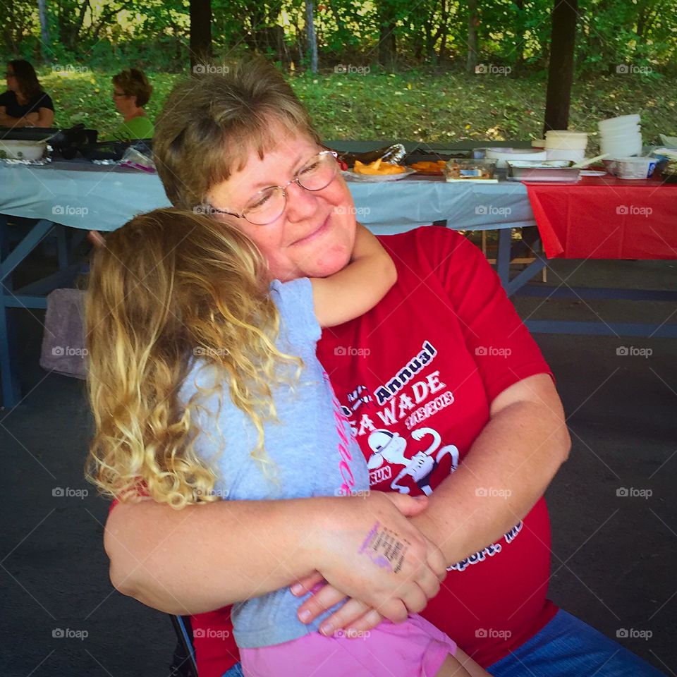 Sweet girl hugging her father