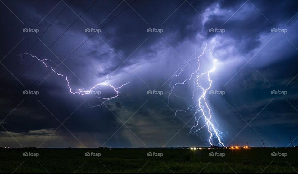 thunderstorm and lightning in the night sky