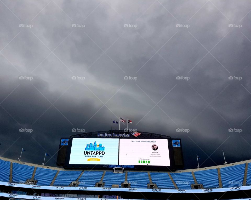 Dark storms roll into the Untapped Festival at Bank of America stadium, Uptown Charlotte, engulfing skies