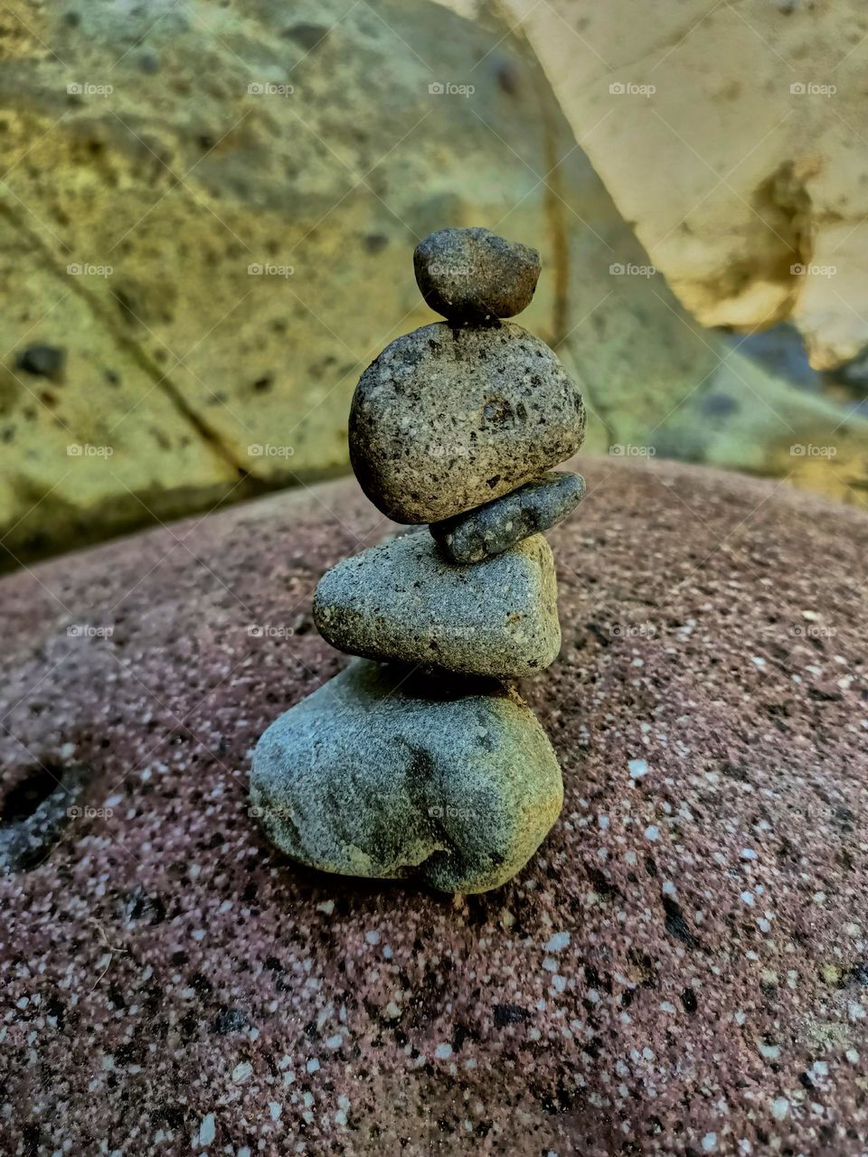 Stack of stones balancing on the river