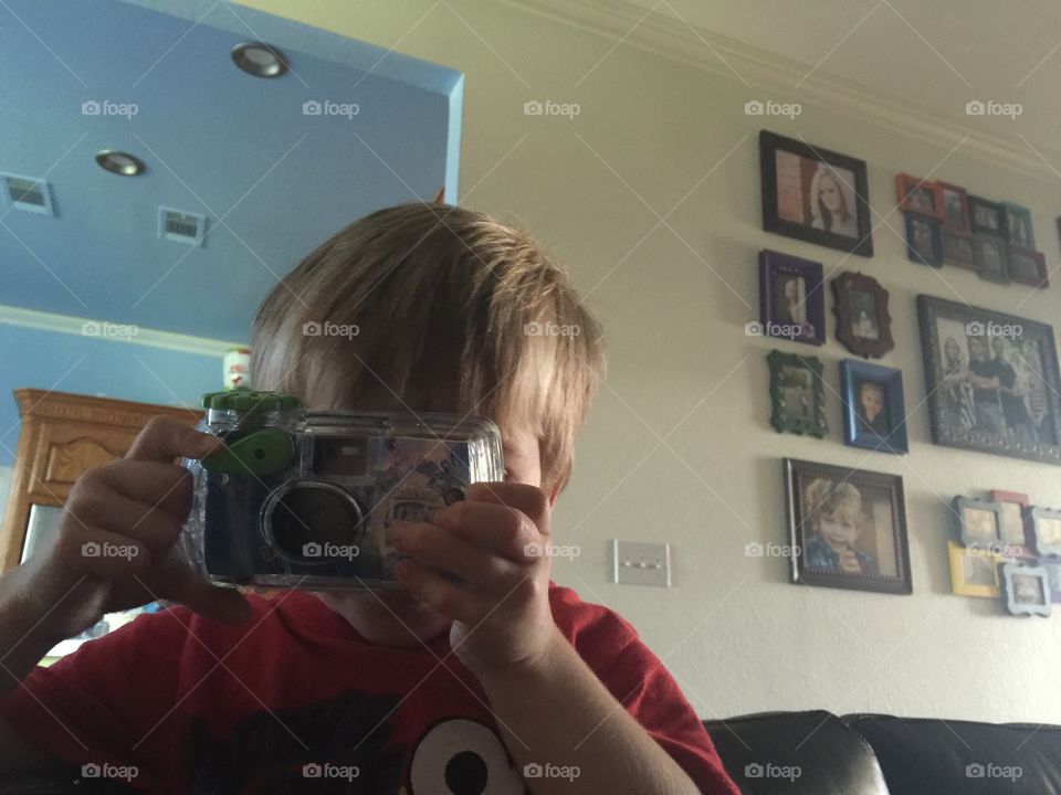 Child taking a photo