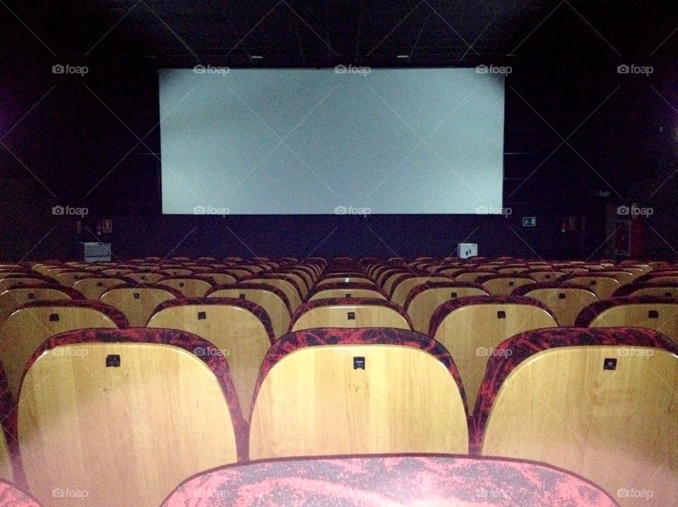 Seats and a screen in the cinema
