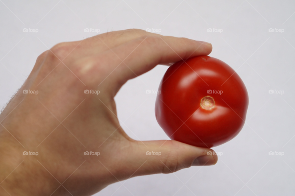 food hand tomatoe j by lexlebeur