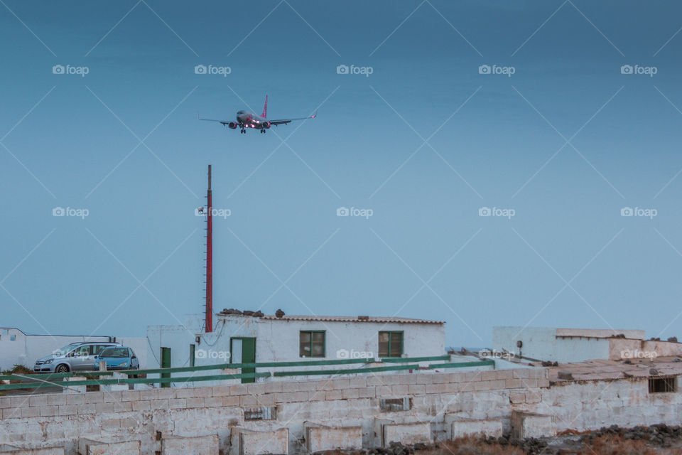 Low pass Airplane over houses