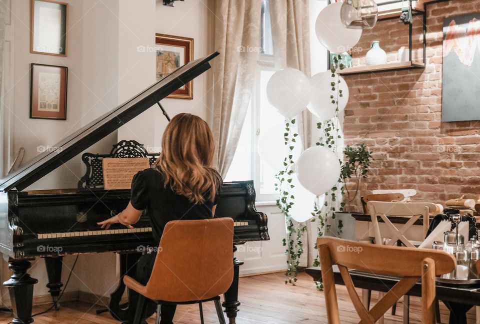 Woman playing piano