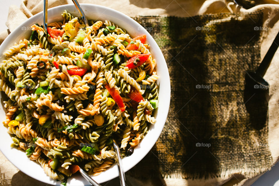 Large bowl of pasta outdoors 