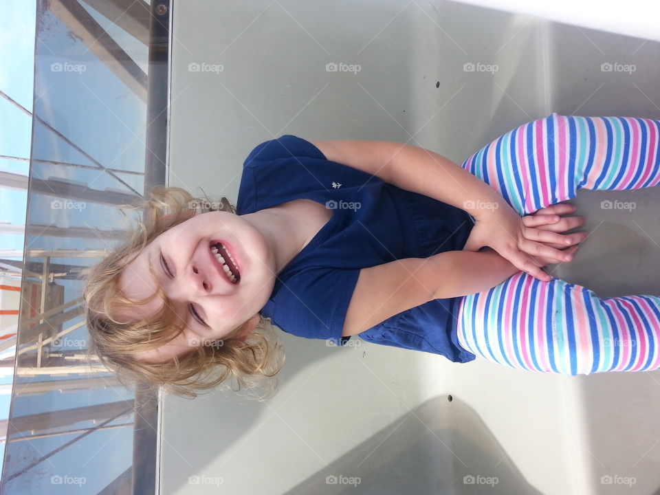 Evelyn's First Ferris Wheel. I took her to the carnival to ride a Ferris wheel, by her reaction I'm sure you can tell how much she enjoyed herself. 
