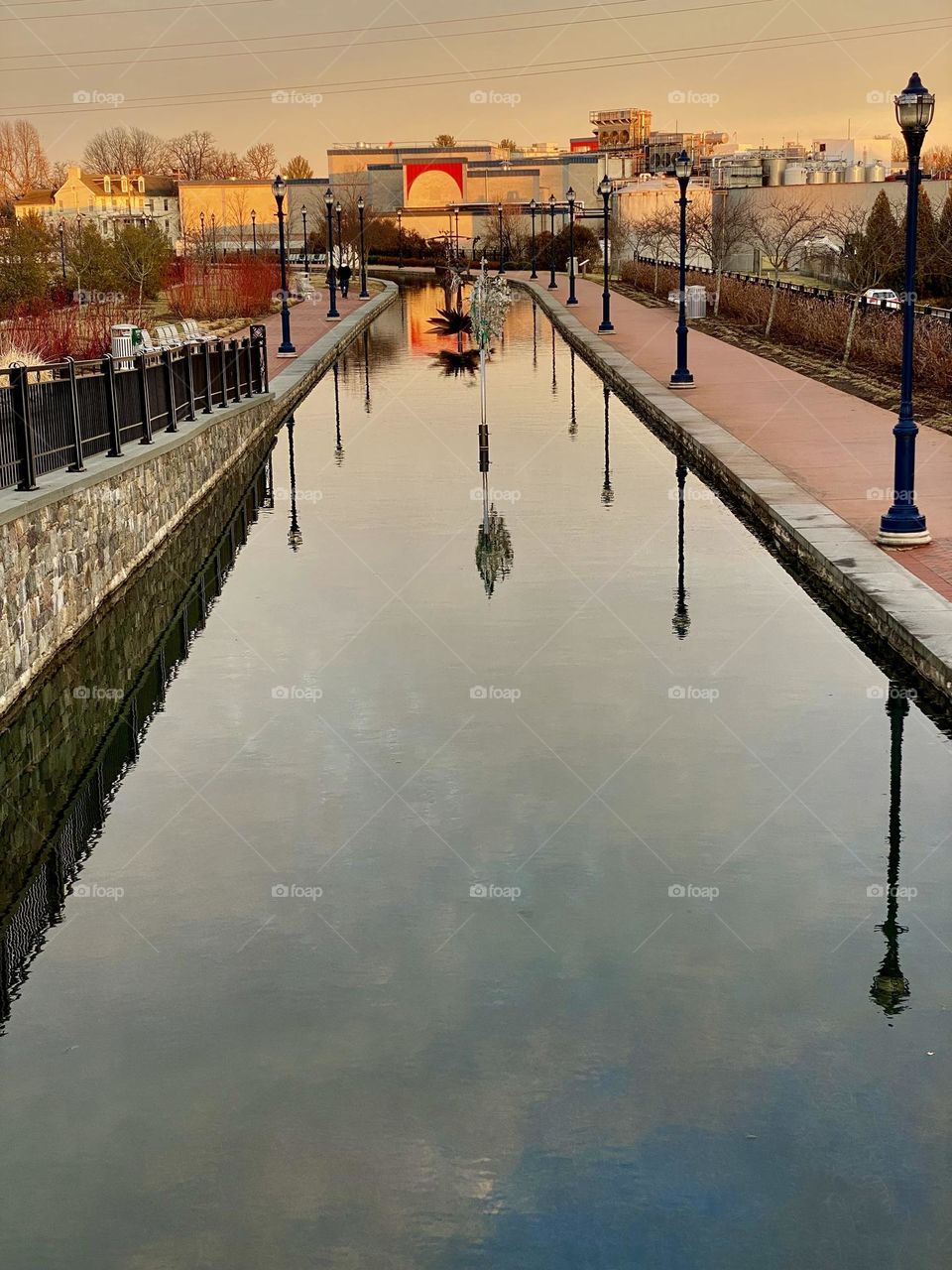 Reflections in the canal along Carroll Creek in Frederick Maryland 