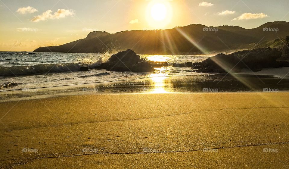 Sunset on a grainy sandy beach
