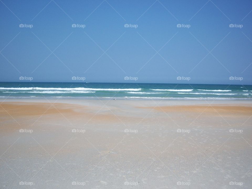 sandy beach and blue water