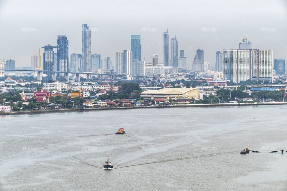 Beautiful skyscraper in front of blue sky background in Bangkok Thailand