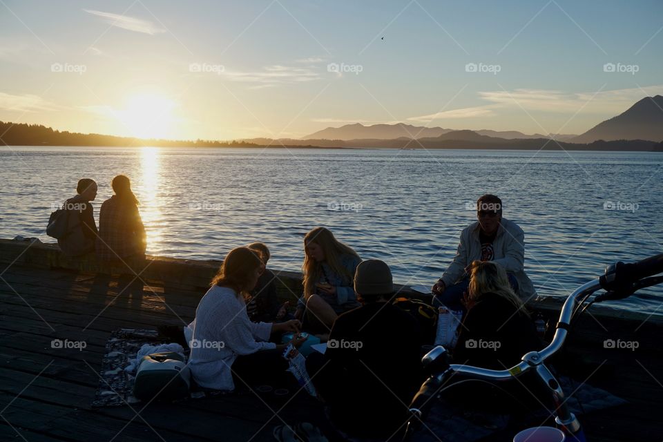 Picnic on the pier watching the sun set 