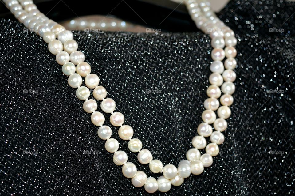 Close-up of pearl necklace