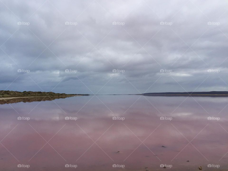 Going to the beach on every vacation helps me relieve stress most effectively. When I go to a sea, I always take pictures to remember the seas I've been through. This is a pink sea in Áutralia.