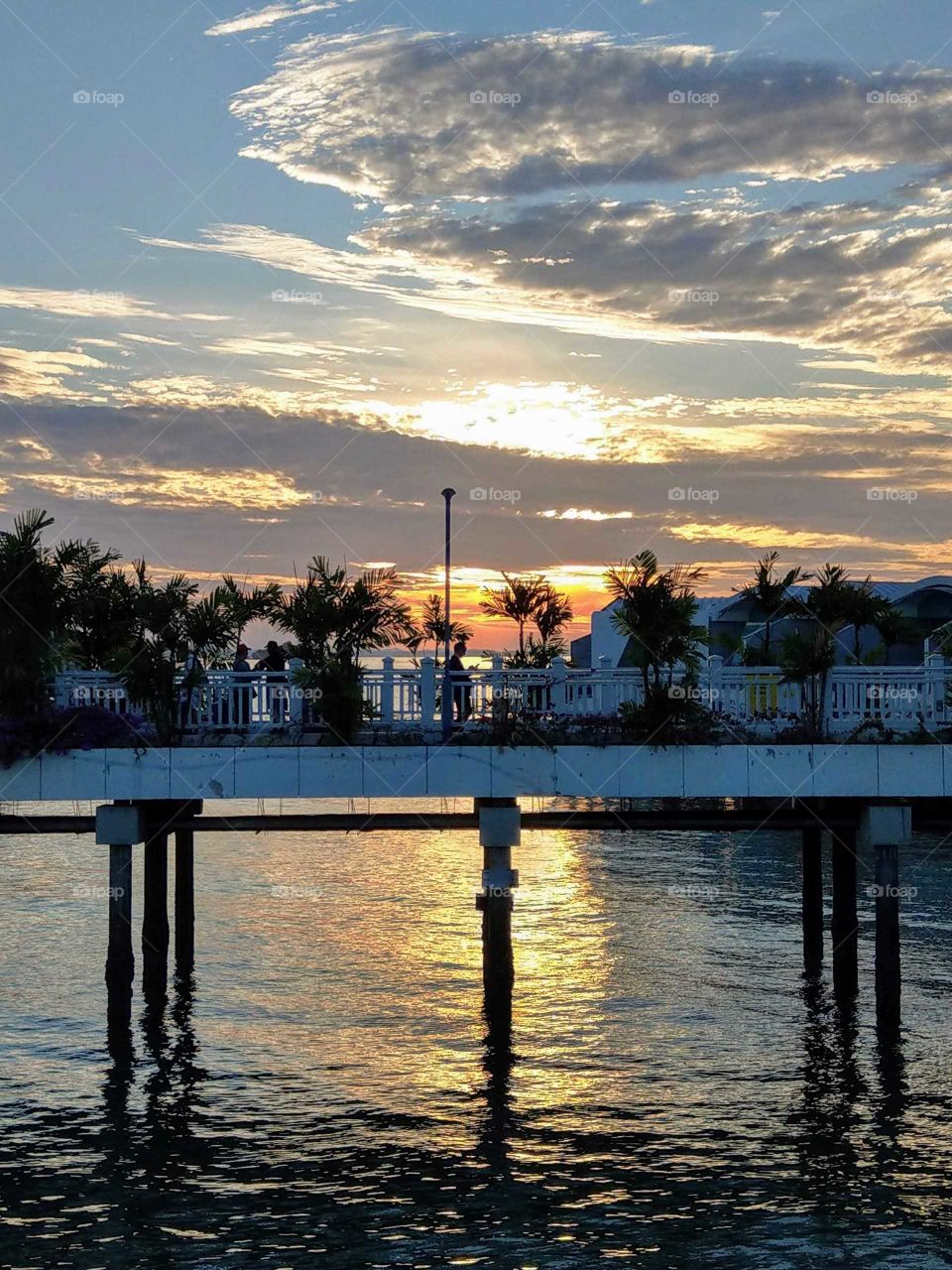 sunrises, sunsets and the moon: watching sunrise in the seashore bridge.