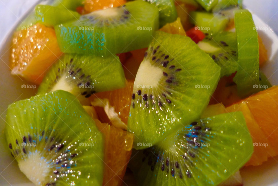 orange kiwi fruits slices by danielmorman