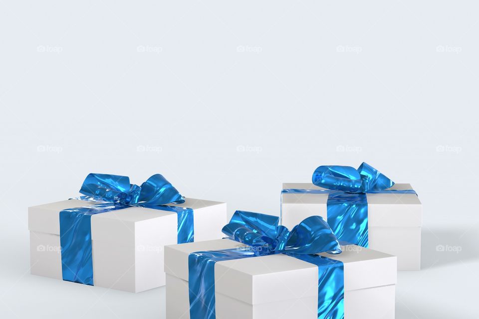 Christmas New Year colorful gift boxes with bows of ribbons on the white background. 3d illustration with space for your text