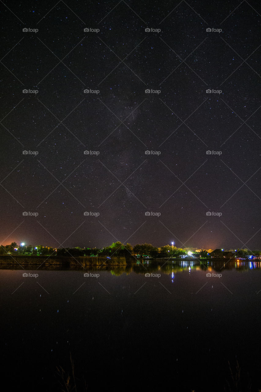 Starry Night. It's hard to be able to take a cityscape photo, with visible stars. With this small city the light from the city blended