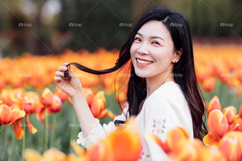 Beautiful brunette woman in park