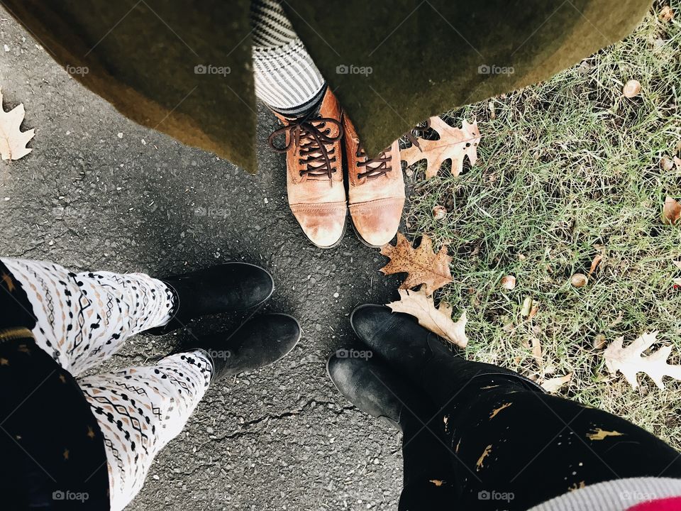 Taking a walk with my girls and we all have boots on and all of our colors are earthy and complimentary. 
