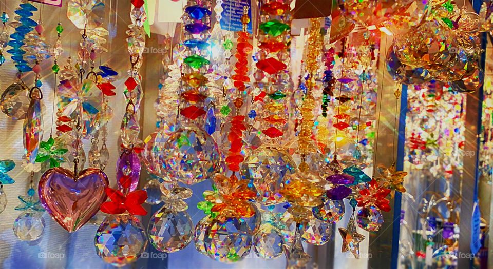 Sparkling prisms sending rainbows into the light. 