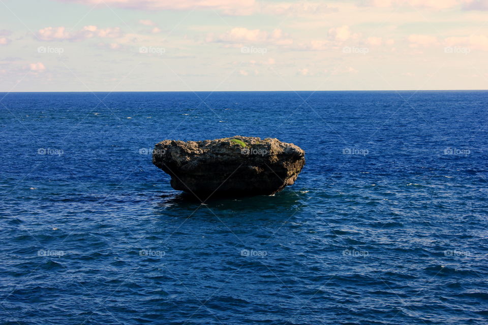 Stone in the middle of the sea