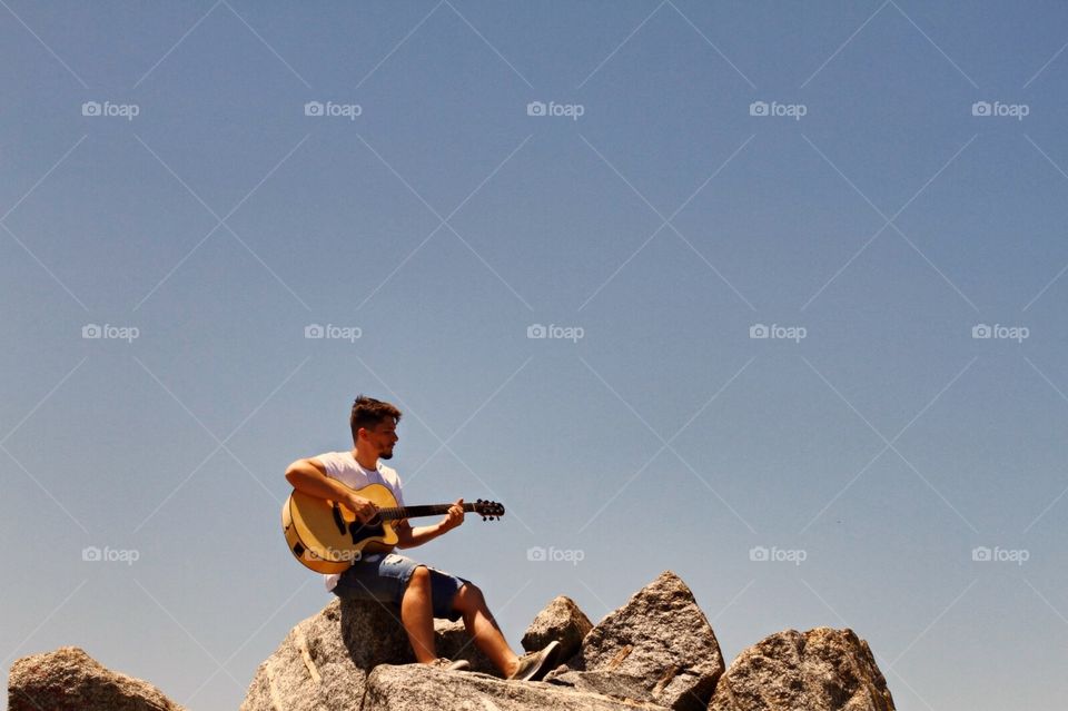 the boy with his guitar