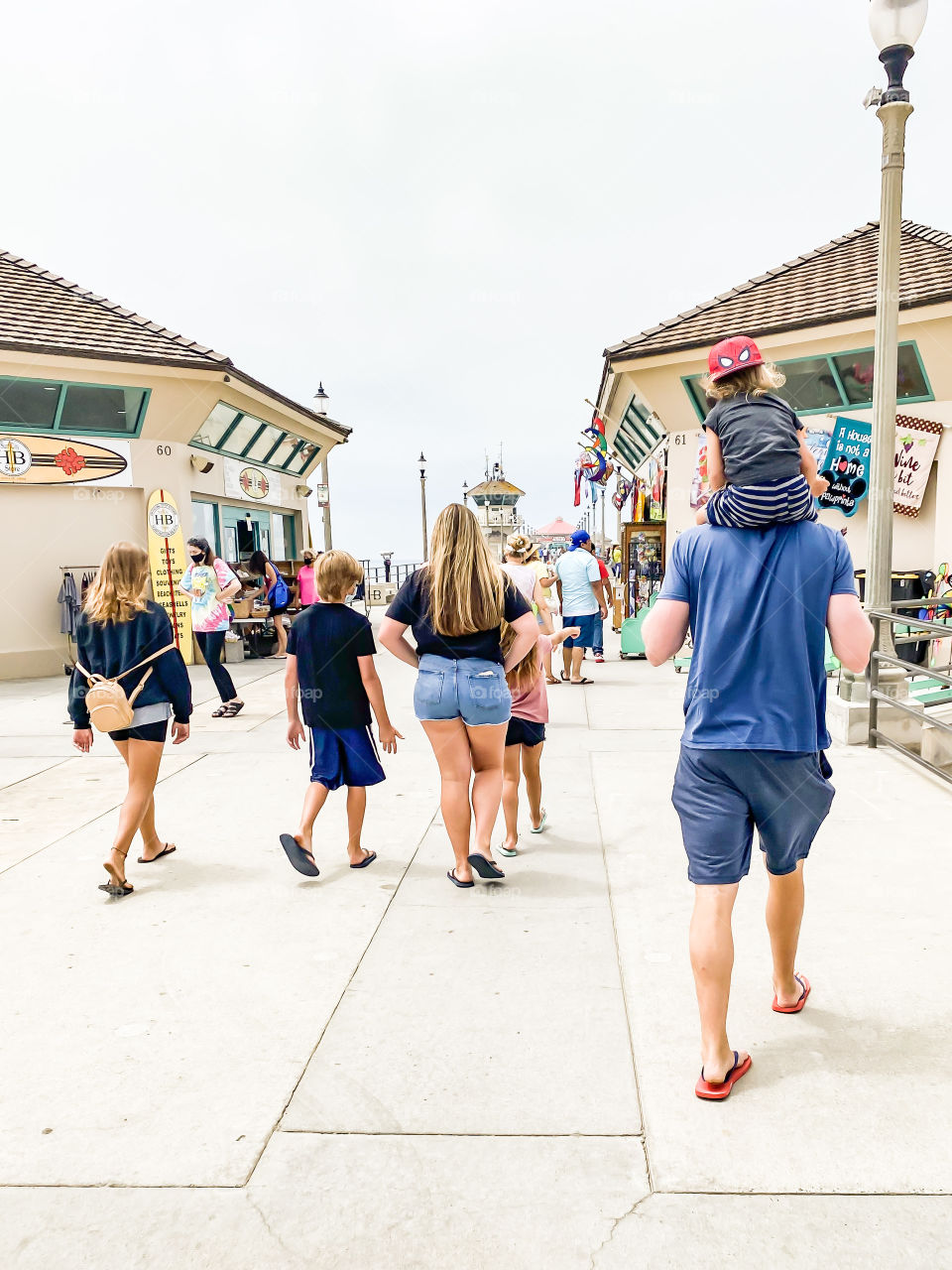 Huntington Beach pier is a magical place where you can can to fish and see little shops. You can even get a yummy milk Shake at the end of the pier! 