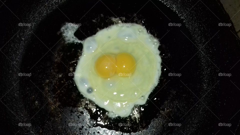 A beautiful double yolk in hen