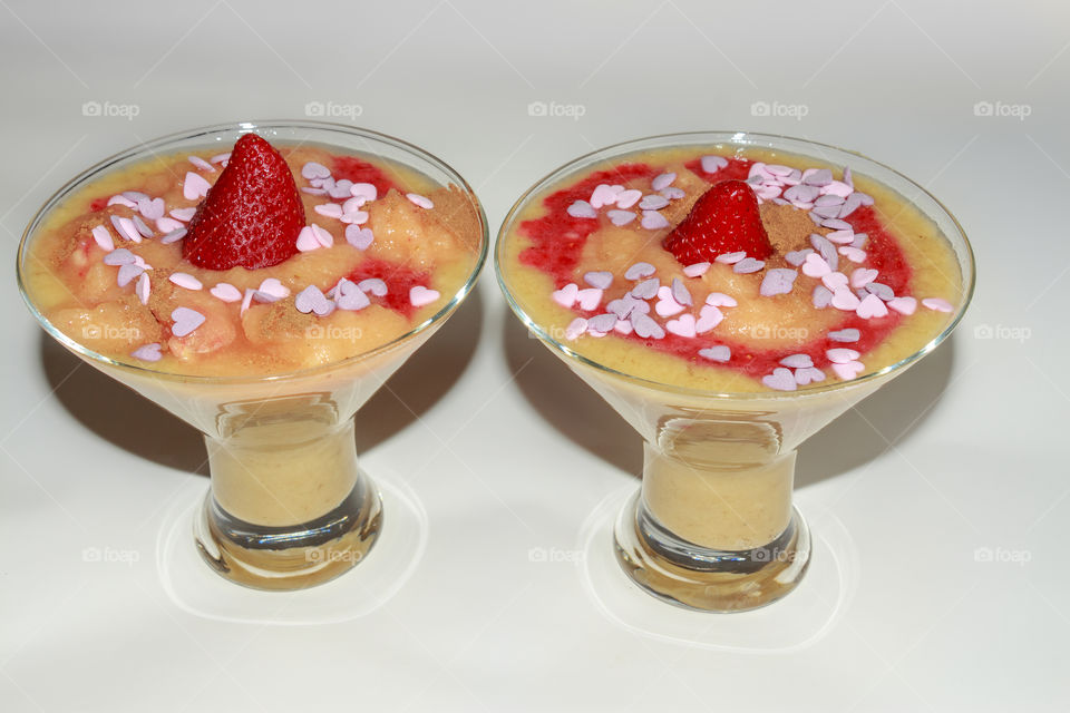 Delicious dessert made from fruits and decorated with sugar heart
