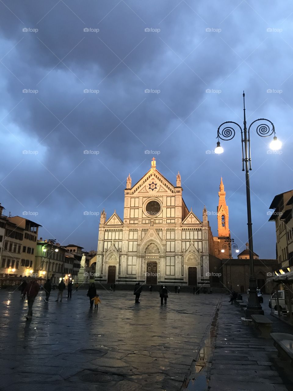 Piazza Santa Croce at dusk in Florence, Italy.