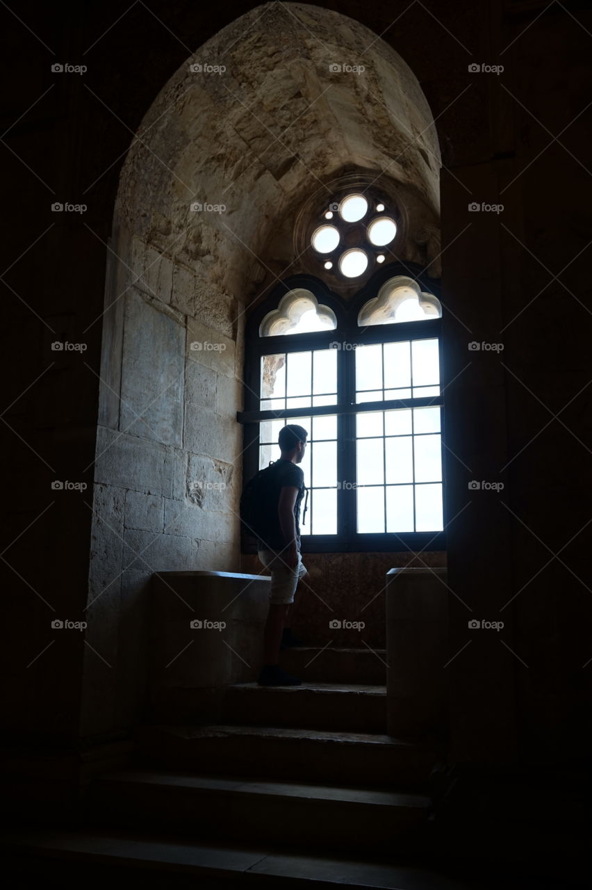 Boy at Castel del Monte window (castle)