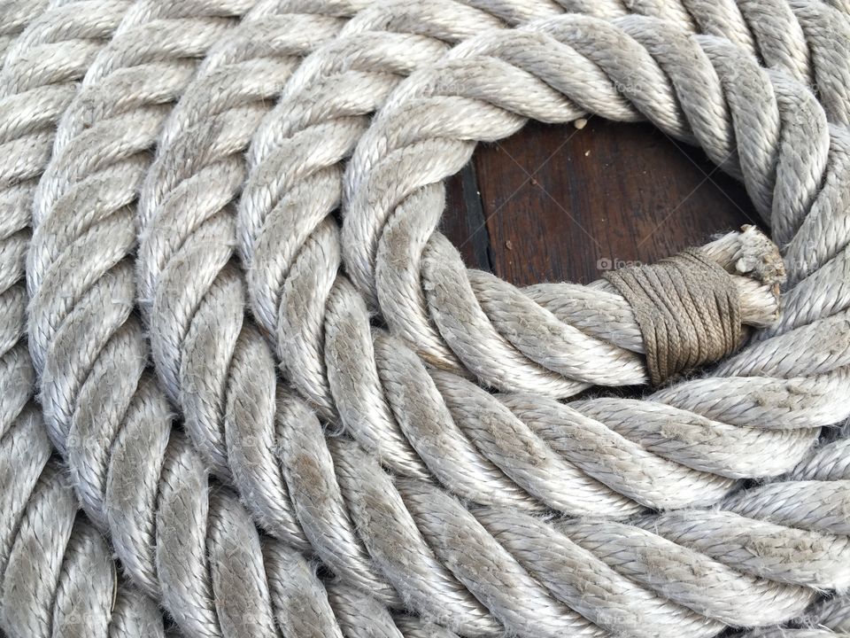 Coil of rope aboard a sailboat