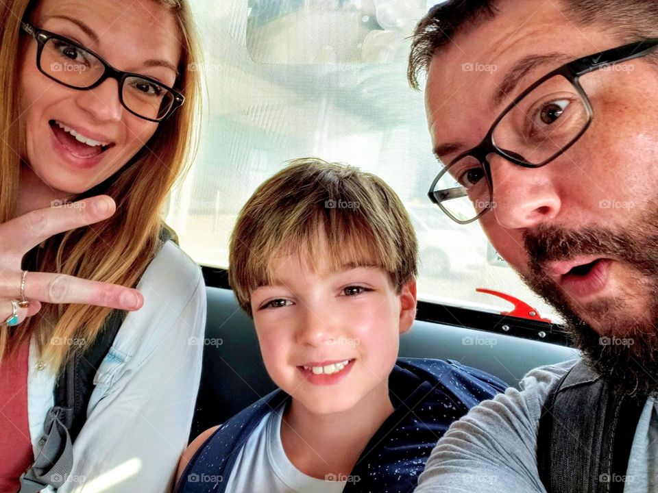 Family selfie on a bus