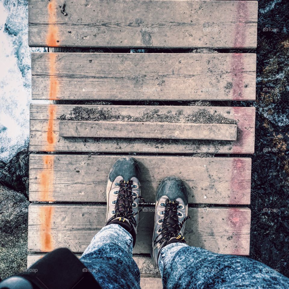 Hiking boots on the bridge 