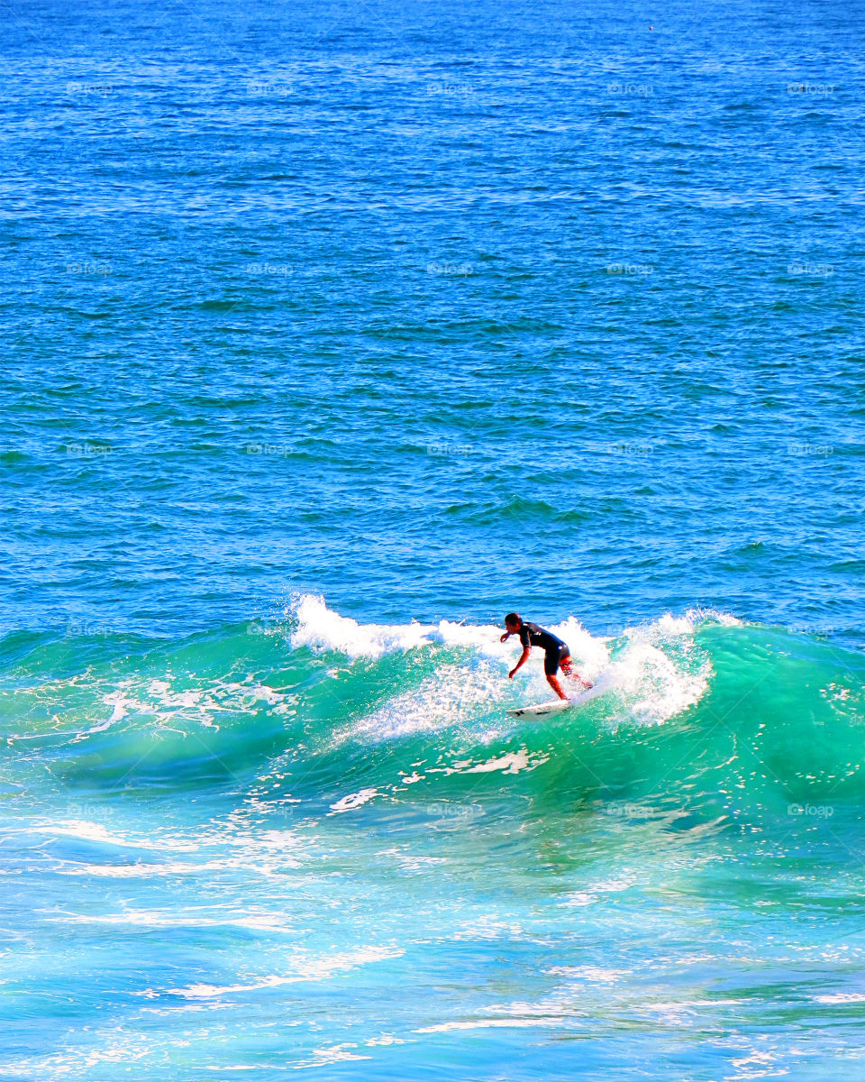 Surfer in Santa Monica beach, CA