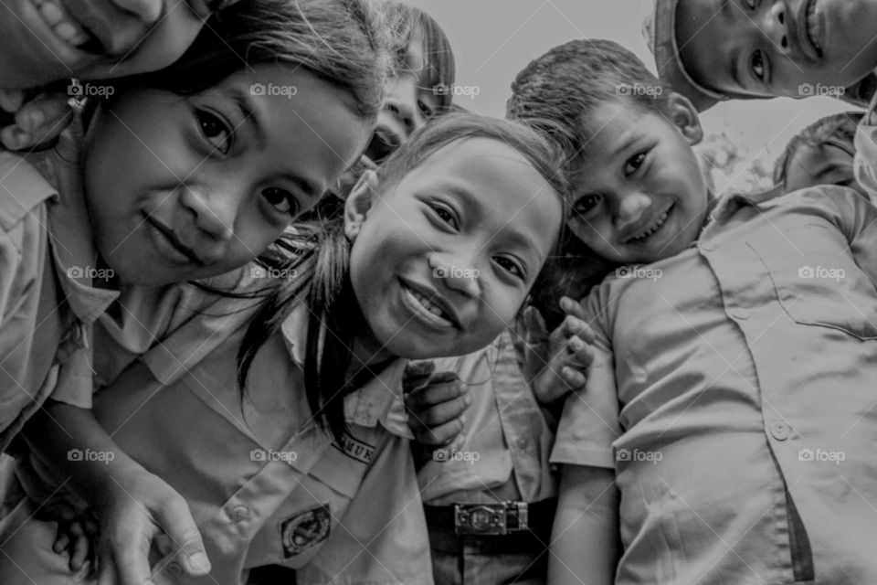 children Smiling at Camera