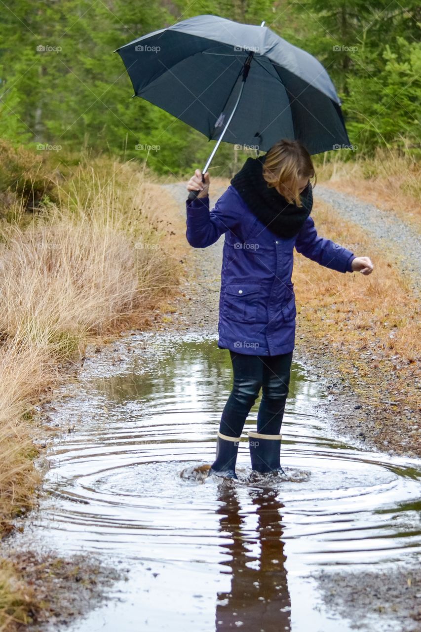 Woman holding umbrella